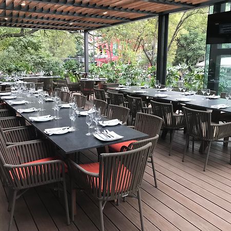 Krystal Grand Suites Insurgentes Mexico City Exterior photo The outdoor terrace at the restaurant