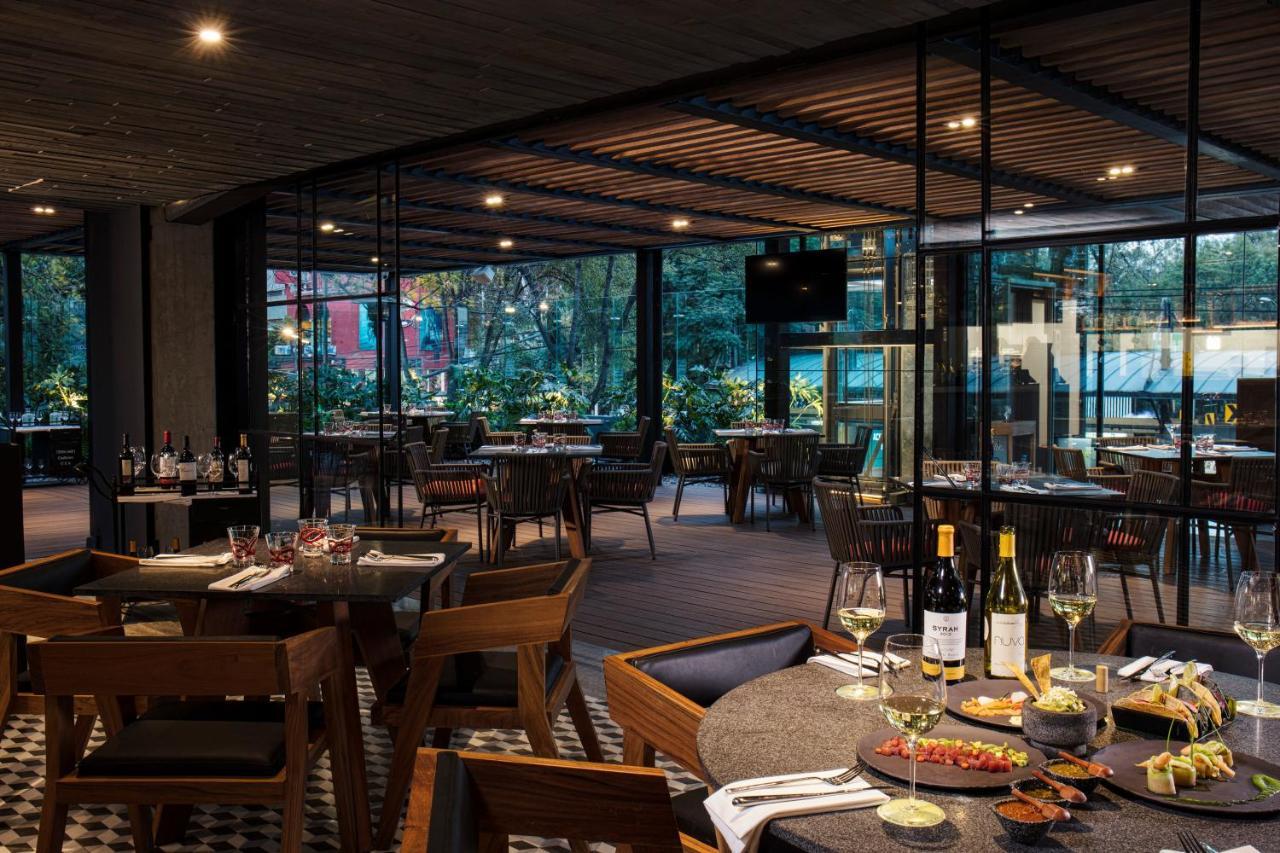 Krystal Grand Suites Insurgentes Mexico City Exterior photo The interior of the restaurant