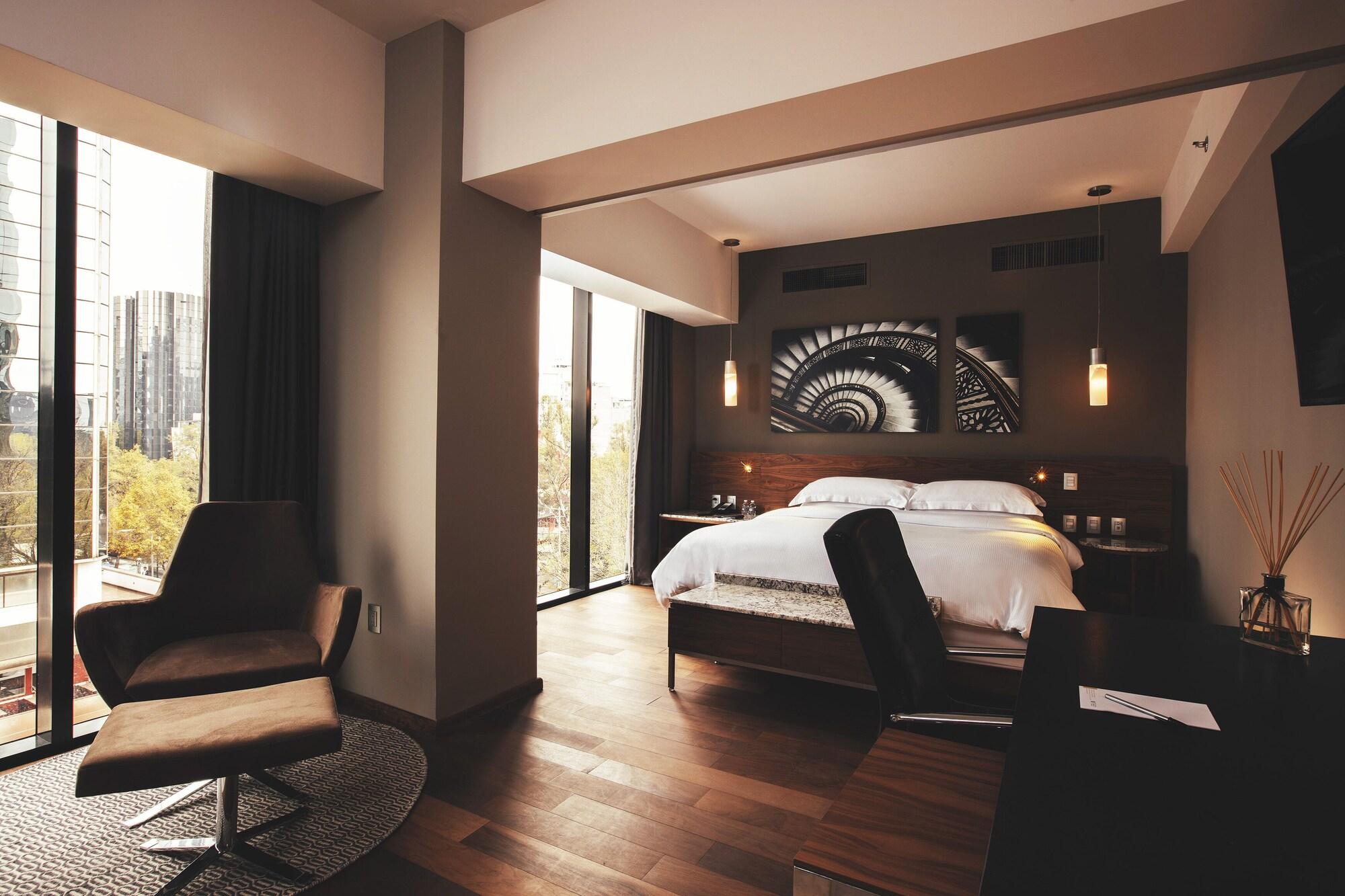 Krystal Grand Suites Insurgentes Mexico City Exterior photo A bedroom at the hotel